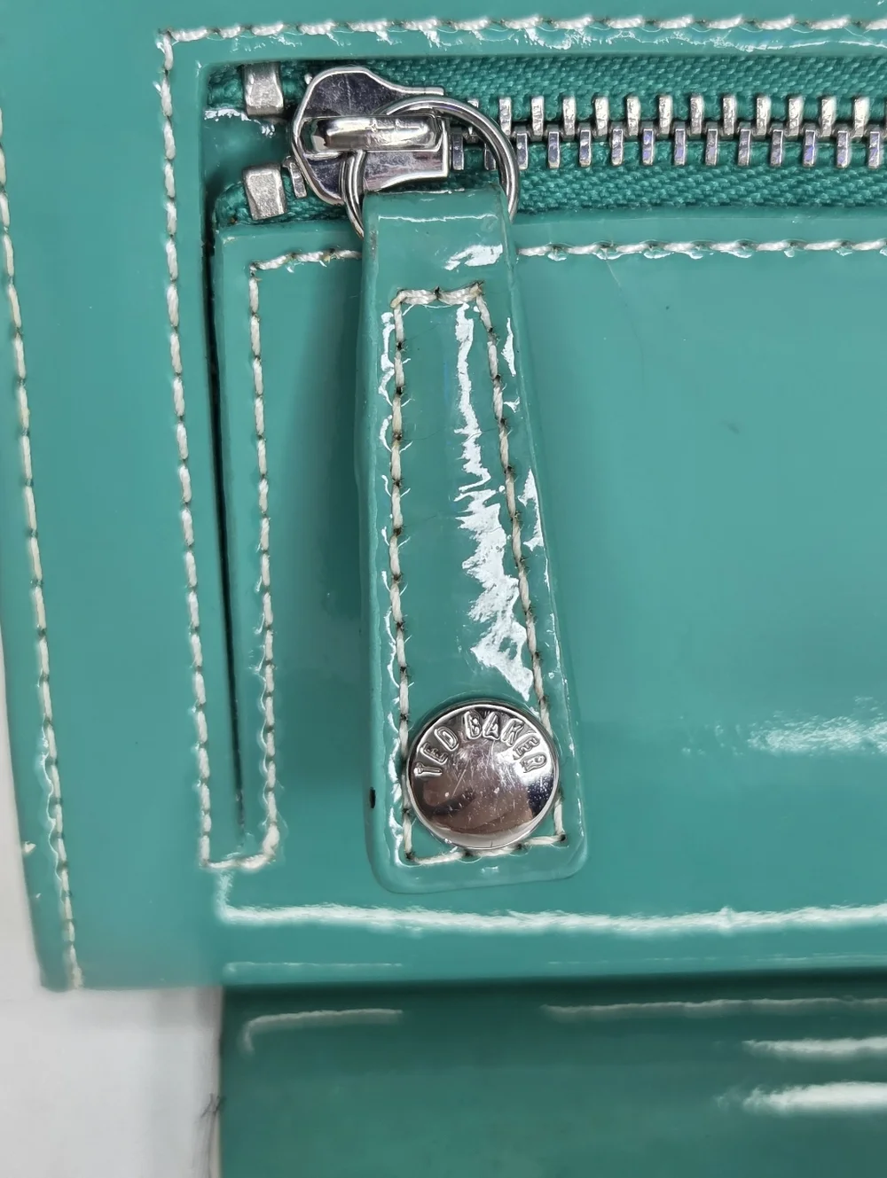 Ted Baker Turquoise Patent Leather Zip Wallet withSilver Accents/Floral Interior - Picture 5 of 14